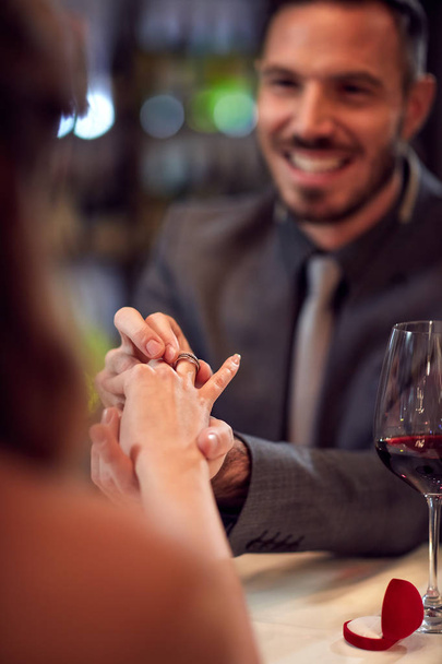 Engagement in restaurant - Φωτογραφία, εικόνα