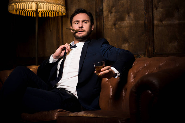Rich businessman with cigar - Photo, image