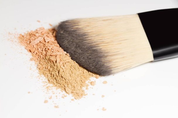 Makeup brush with powder foundation isolated on white - Photo, Image