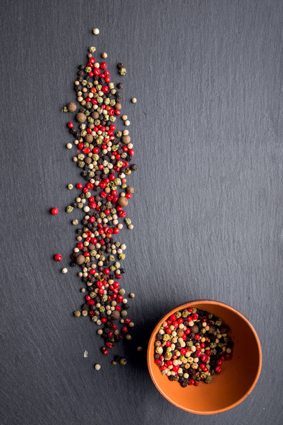 pepper on a slate board - Foto, Imagem