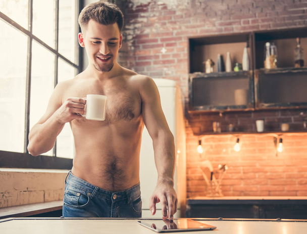 Sexy guy in the kitchen - Photo, Image