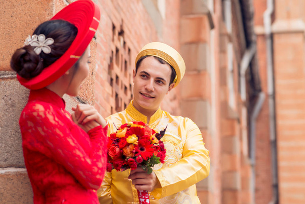 man giving bouquet to his bride - Photo, Image