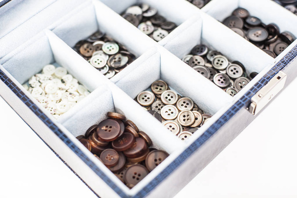 Buttons in a box - Photo, Image