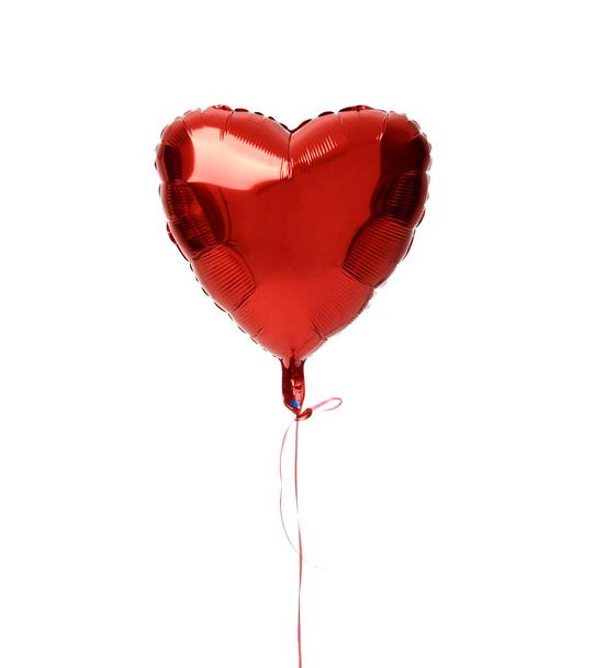 Single red big heart metallic balloon for birthday  - Фото, изображение