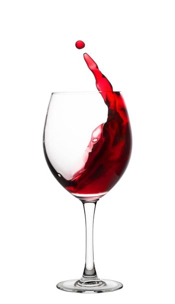 Egy csobbanás pohár vörös bor - Fotó, kép