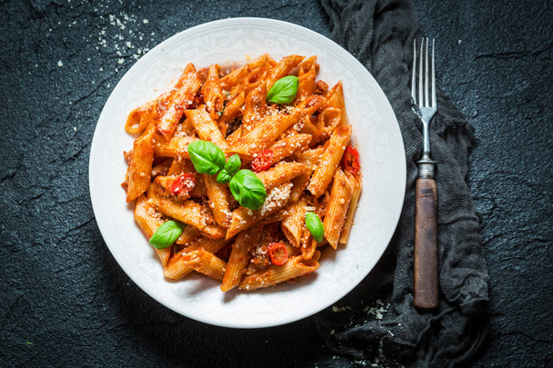 Delicious pasta bolognese with parmesan and basil - Φωτογραφία, εικόνα