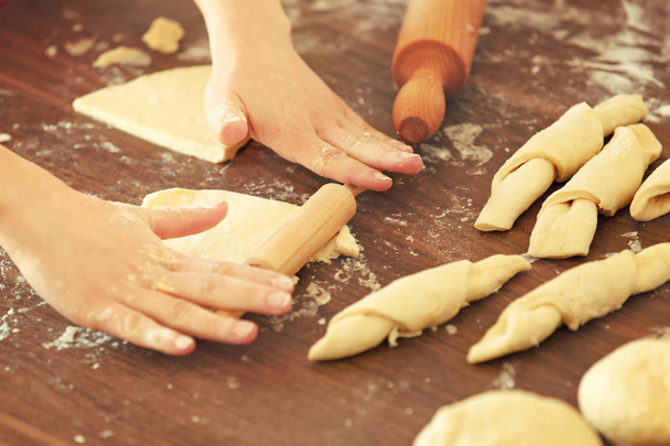 Woman Working With Dough, Making Croissants. Close up.  - Fotoğraf, Görsel
