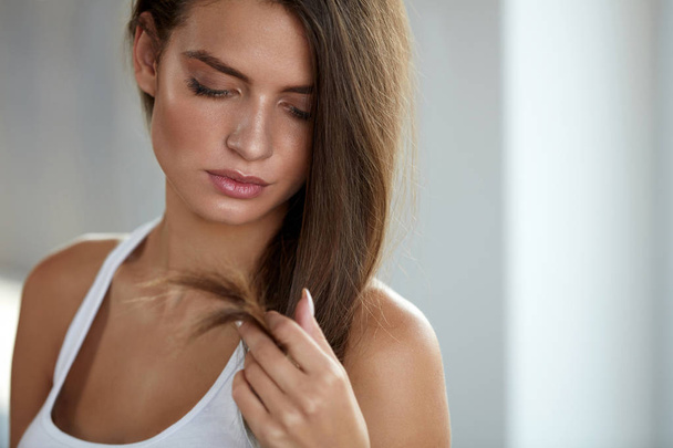Beautiful Woman With Split Ended Hair. Hair Care Concept - Fotoğraf, Görsel