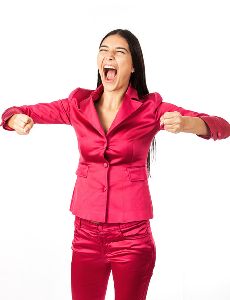 vrolijke jonge vrouw vieren van succes met gebalde vuisten over Wit - Foto, afbeelding