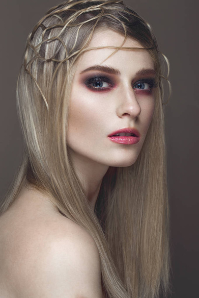 Beautiful fashion woman with creative make-up and hairstyle. beauty face. - Фото, изображение