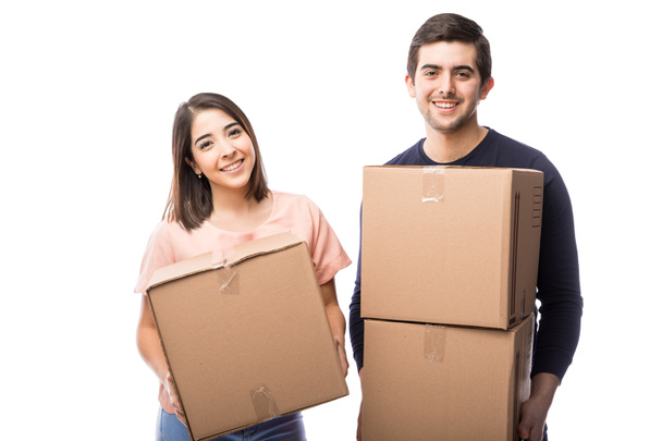 Young couple holding boxes - Photo, Image