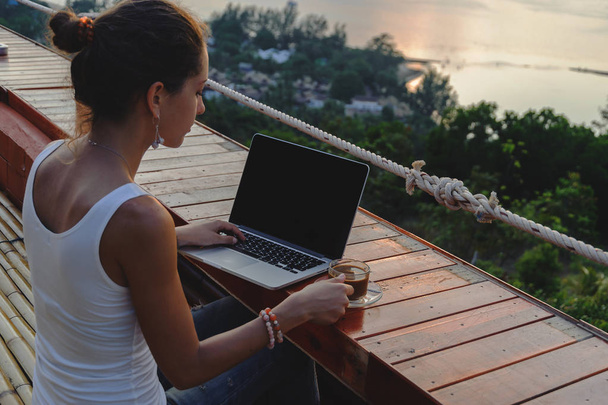 woman freelancer with laptop - 写真・画像