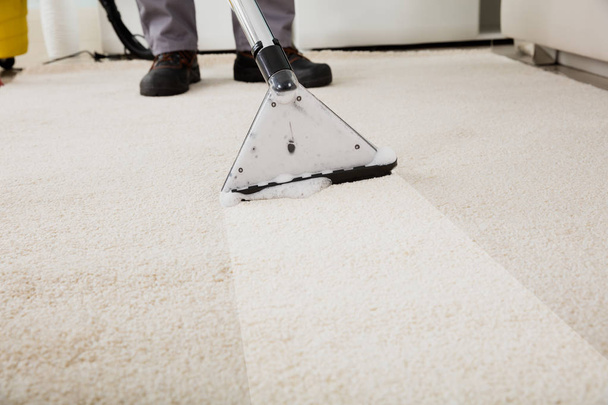 Person Cleaning Carpet - Fotó, kép