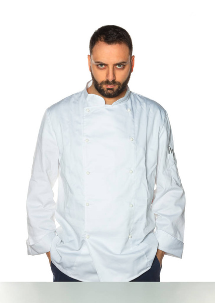 Young chef on white background. - Photo, Image