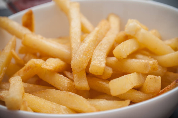  french fries  in a bowl at restaurant - Foto, Imagen