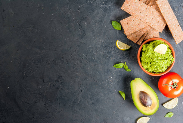 Guacamole with ingredients for sandwiches - Foto, imagen