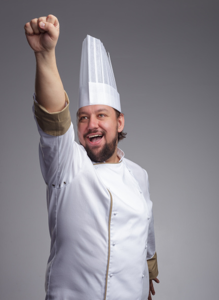 cook  pulls his hand forward - Фото, зображення