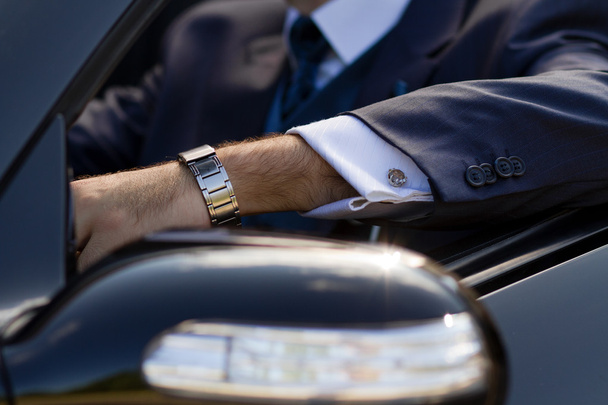 Hand of businessman in cabrio - Photo, image
