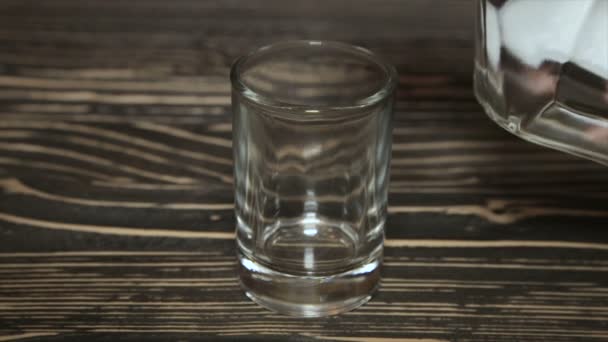 Poured a glass of vodka, close-up . Full hd video - Filmmaterial, Video