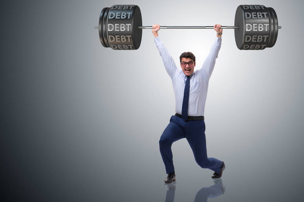 Podnikatel pod těžkým břemenem dluhu - Fotografie, Obrázek