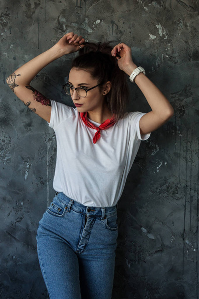 Portrait of beautiful girl dressing in 90s style fashion - Photo, Image