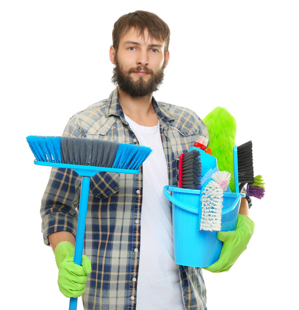 Young man with cleaning supplies - Photo, image