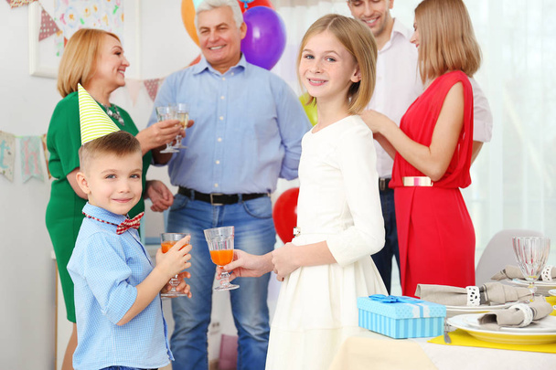 Family celebrating birthday  - Фото, изображение