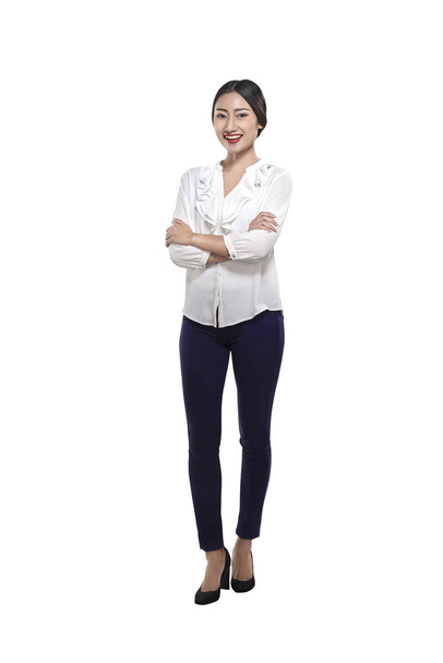 businesswoman standing with folded hands - Photo, image
