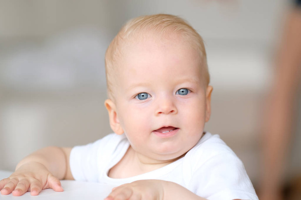 Baby boy with blue eyes - Φωτογραφία, εικόνα