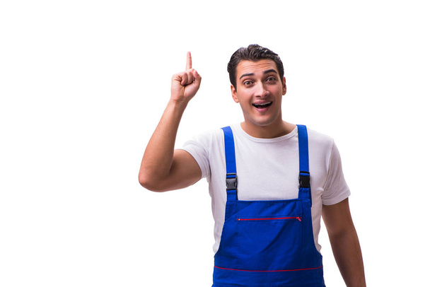 Handsome repairman wearing blue coveralls on white - Photo, Image