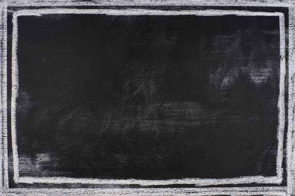 Craie frottée sur le tableau noir.  - Photo, image