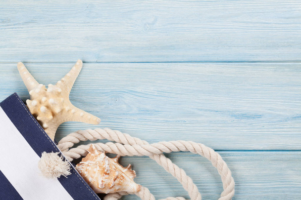 Сумка с морской раковиной и морской звездой
 - Фото, изображение