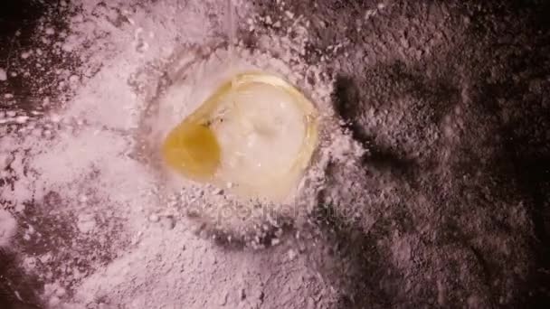 slow motion video of a drop of egg yolk to the flour 240 fps - Footage, Video