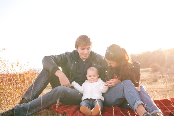  young family having fun outdoors - Foto, Bild