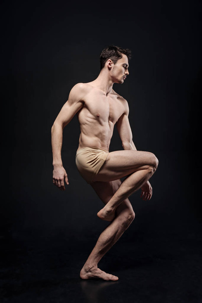 Involved gymnast performing  - Fotografie, Obrázek
