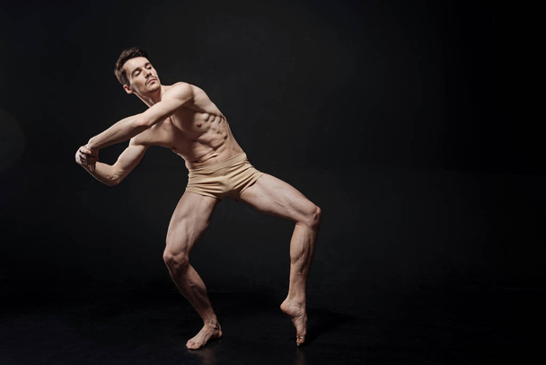 Springy athlete dancing man - Фото, изображение