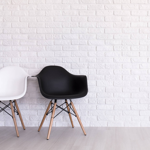 White and black chair in light interior - Photo, image