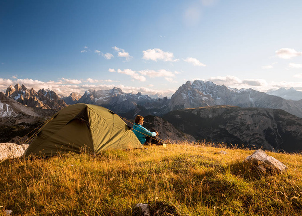 sportsman in high mountains camping - Fotó, kép