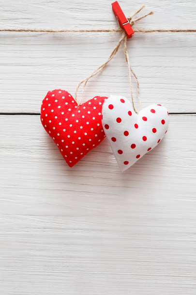 Valentine day background, pillow hearts couple on wood, copy space - Photo, Image