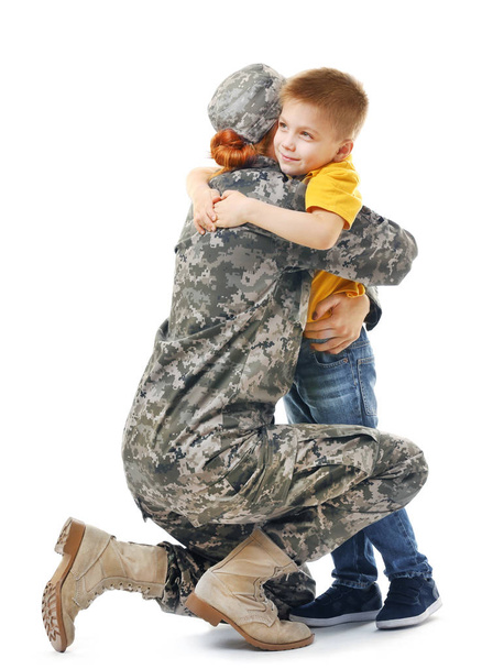 Military mother with her son on white background - Zdjęcie, obraz