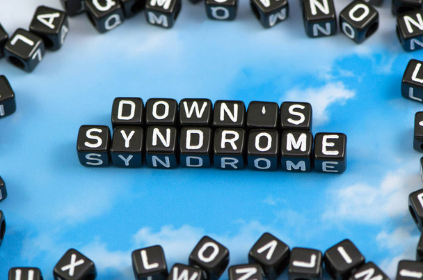 The word Down's syndrome on the sky background - Zdjęcie, obraz