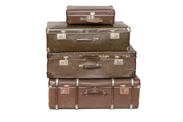 Heap of old suitcases isolated on white - Photo, Image