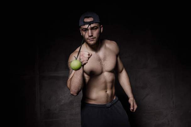 Boxer man training with fight ball - Foto, immagini