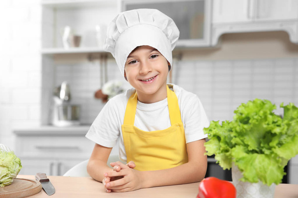Cute boy cooking  - Fotó, kép
