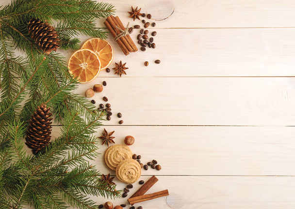 Christmas background with fur-tree branches, cones, dried orange - Fotografie, Obrázek