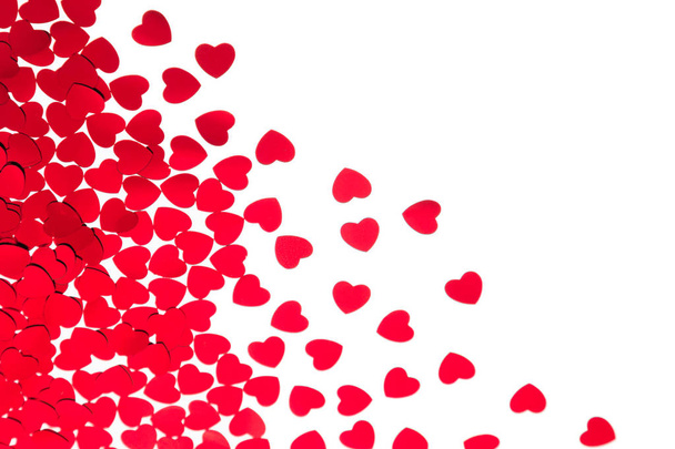  Valentine's day  decorative border of red hearts confetti isolated on white background. - Foto, Imagen