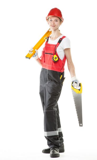 Construction worker in uniform with tools - Valokuva, kuva