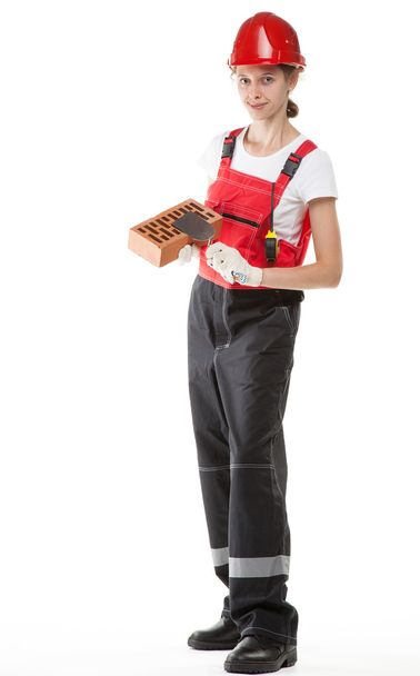 Construction worker in uniform with tools - Foto, Imagen