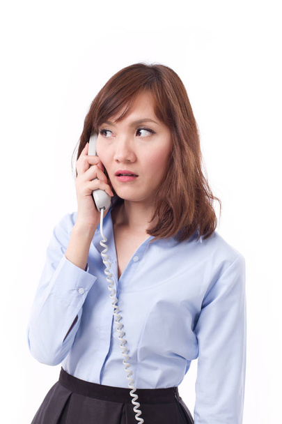 surprised, stunned, negative woman on phone, studio isolated - Фото, изображение