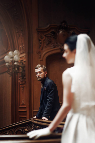  groom looking at his gorgeous bride - Fotografie, Obrázek